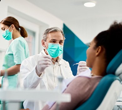 Patient in San Antonio smiling with their new dental implants