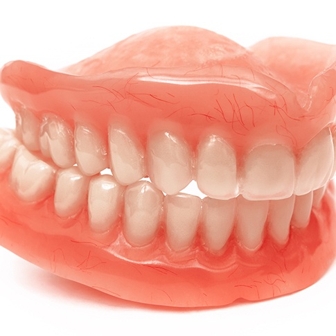 Close-up of full dentures in San Antonio, TX for both arches